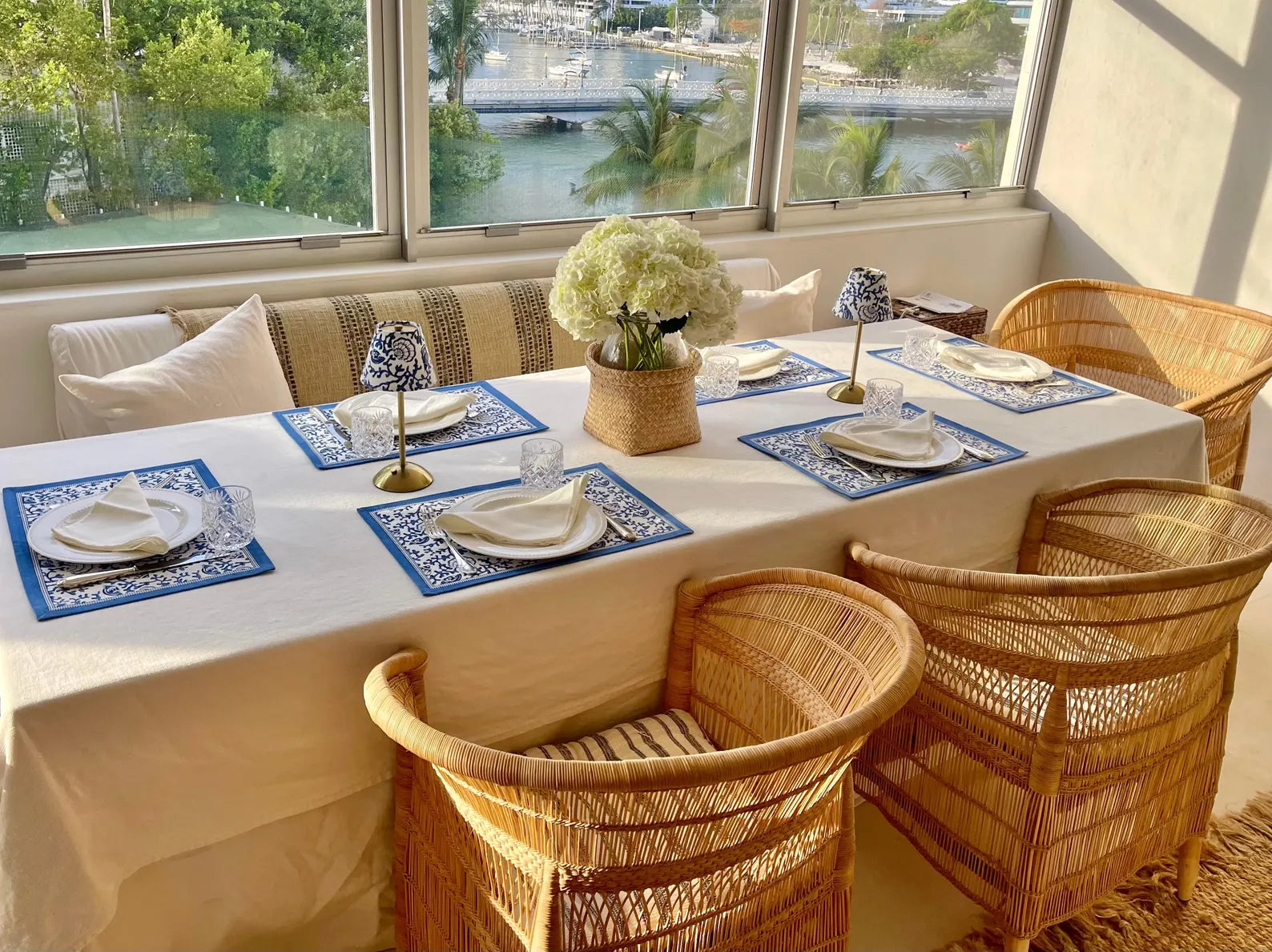 A bright and airy tablescape featuring Blue Shells Lamp Shades, showcasing their compatibility with different styles and spaces.