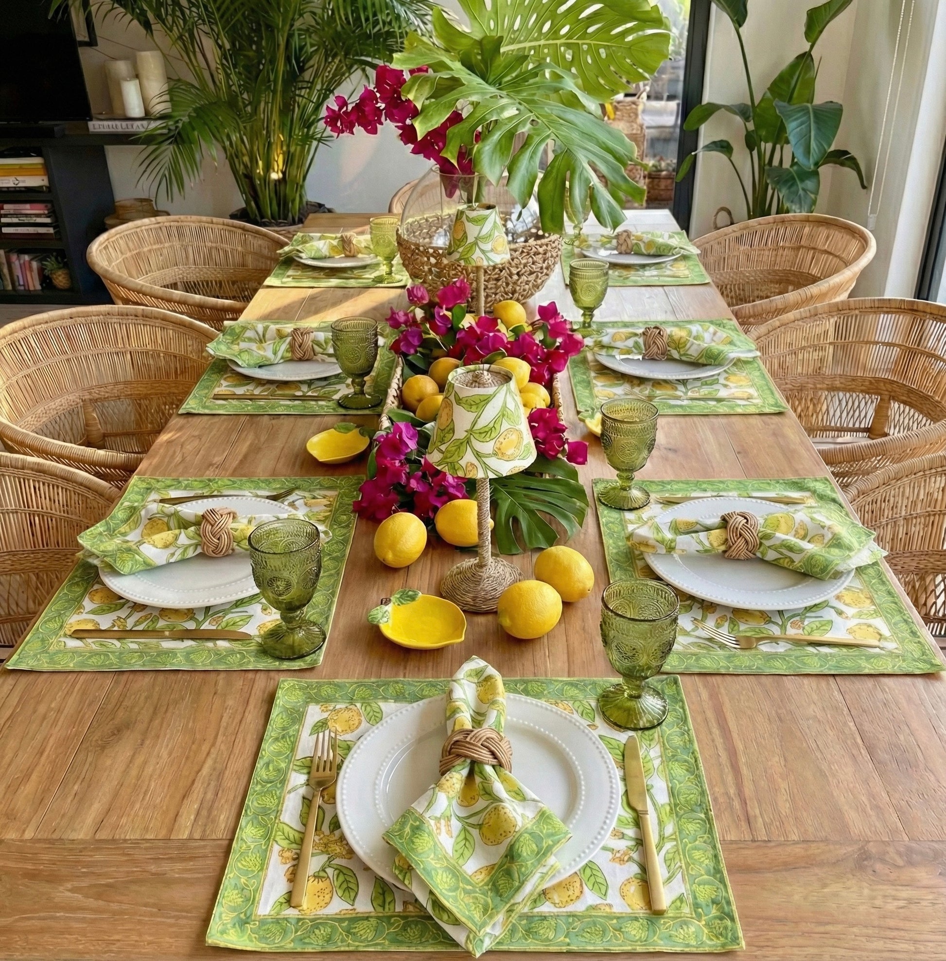 A Mediterranean summer dining tablescape featuring The Lemon citrus shade on a cordless lamp with coordinated linens.