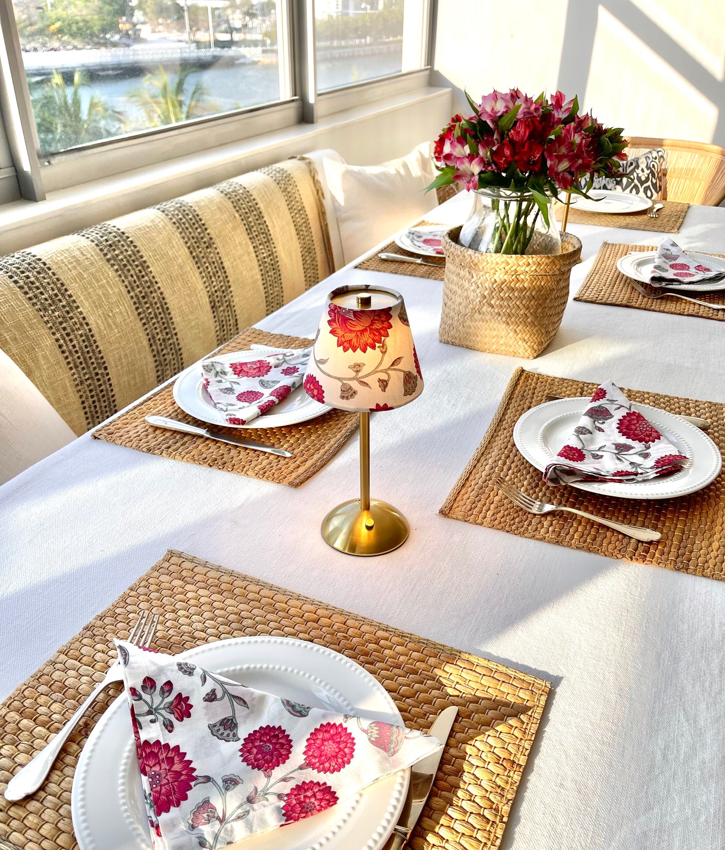 The Nandina Lamp Shade styled on a dining table with matching napkins, creating a coordinated and elegant tablescape.